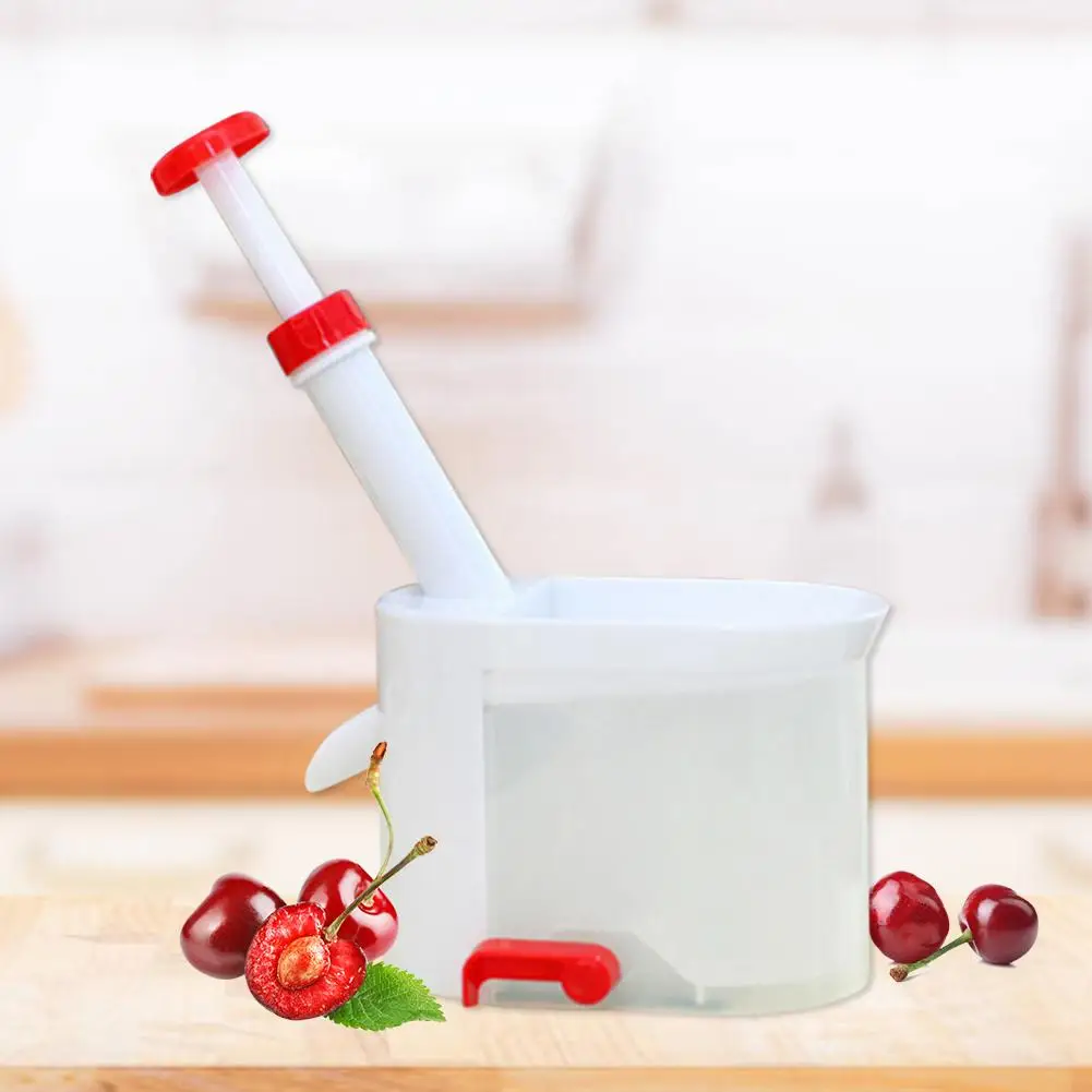 Machine d'extraction de graines de cerises