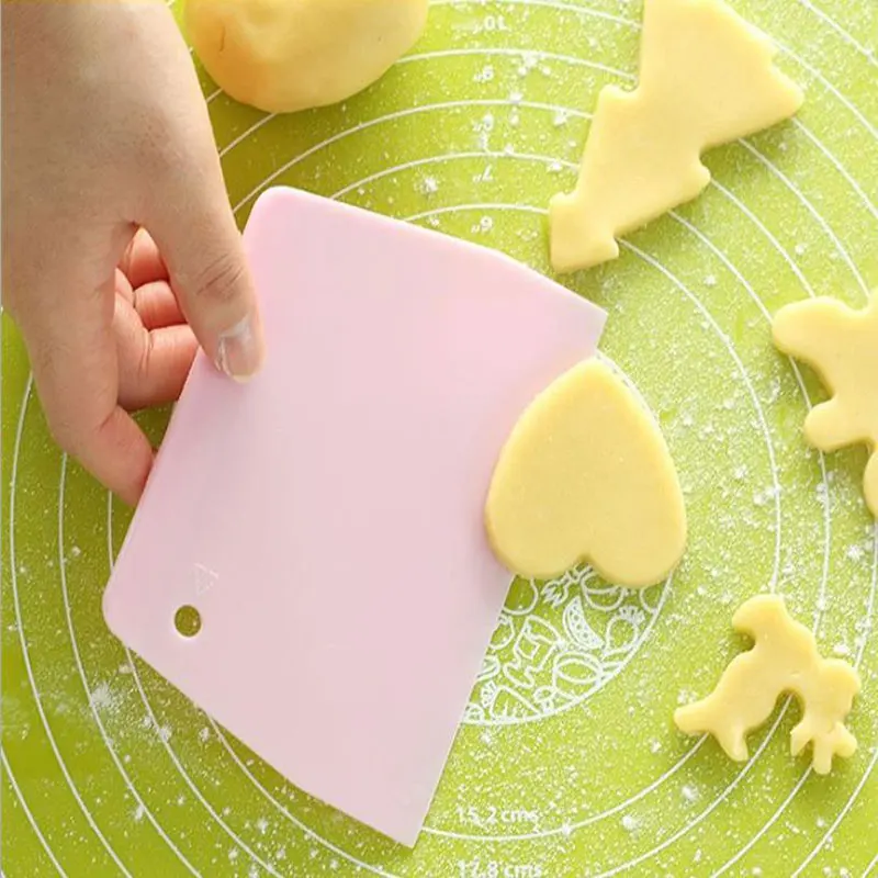 Grattoir à pâte à pizza en plastique