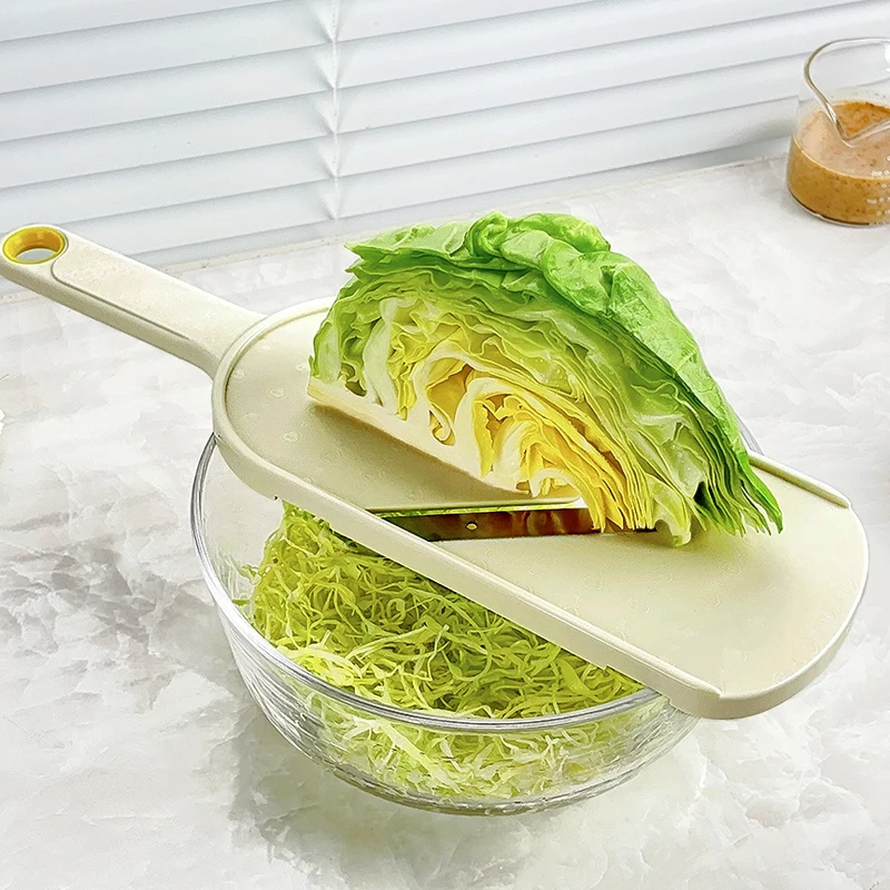Coupe-légumes et râpe à chou
