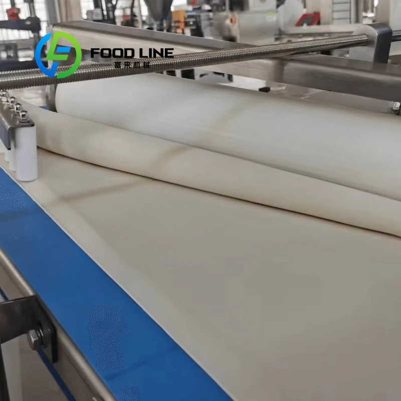 Machine automatique de fabrication de pain et de gâteaux