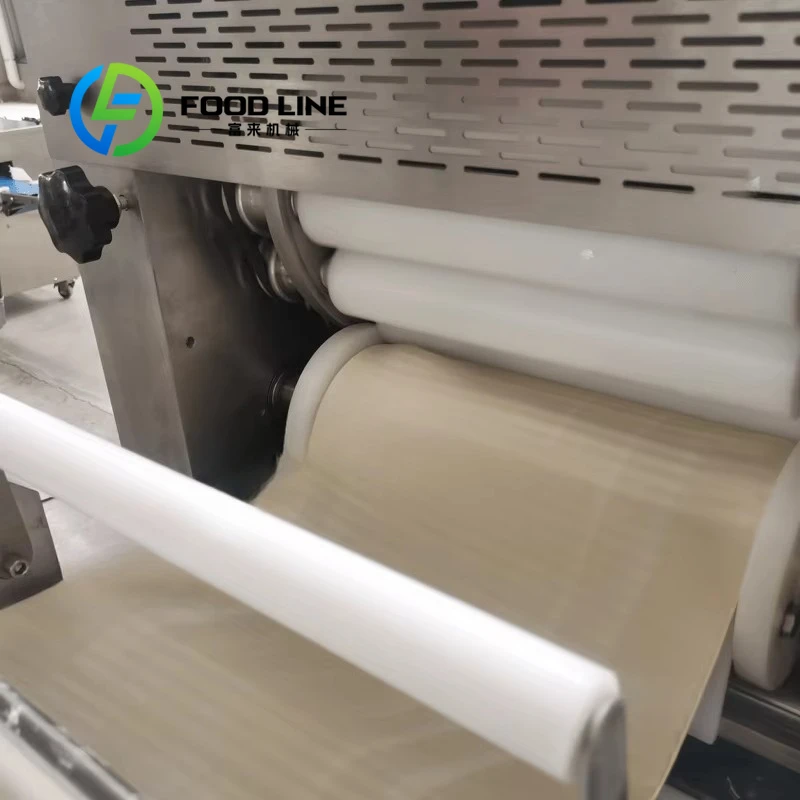 Machine automatique de fabrication de pain et de gâteaux