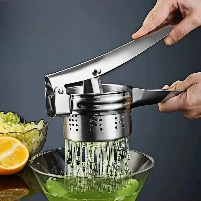 Extracteur d'eau de légumes manuel en acier inoxydable