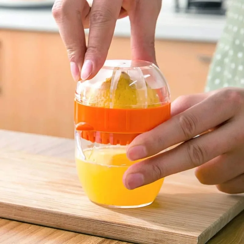Presse-citron manuel en plastique avec couvercle