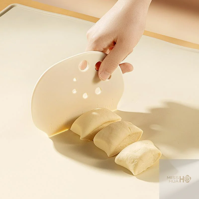 Grattoir à pâte bol