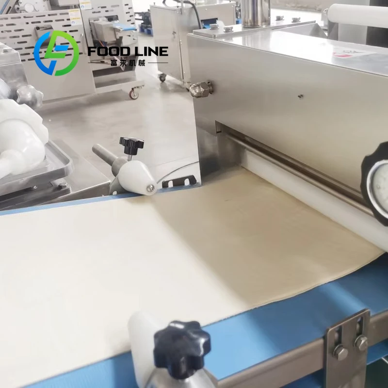 Machine automatique de fabrication de pain et de gâteaux
