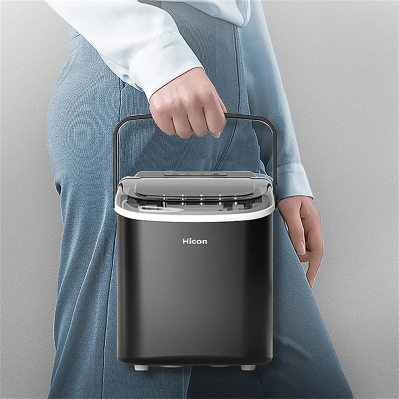 Machine à glaçons électrique avec poignée